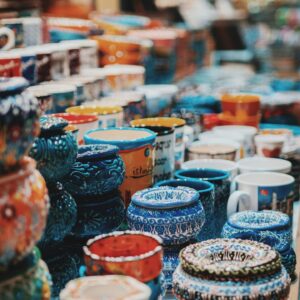 blue and orange ceramic jar